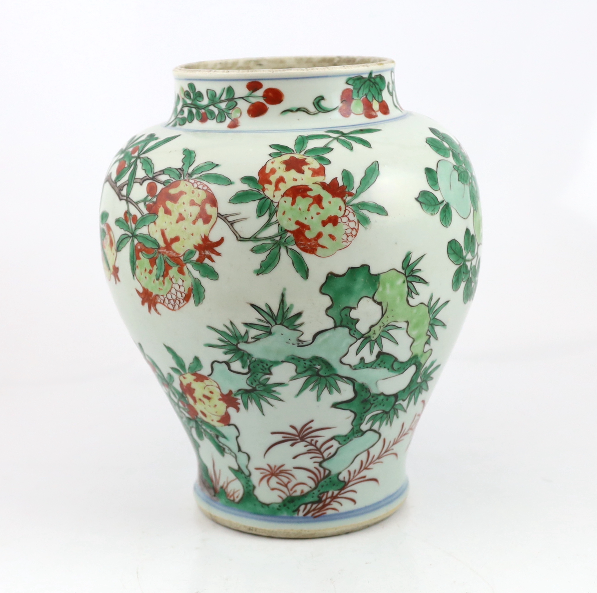 A Chinese wucai ‘pomegranate’ baluster vase, Transitional, Shunzhi period, c.1650